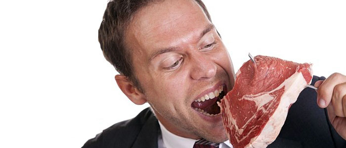 man eating meat protein