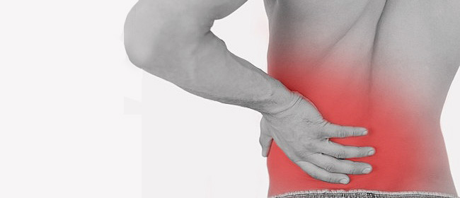 man suffering from back pain