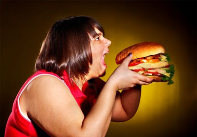 obese woman eating food