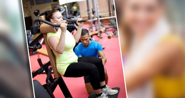 obese woman doing resistance training