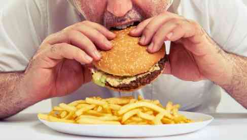 fat man eating