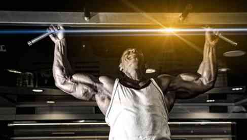 man doing fitness routine pull-up