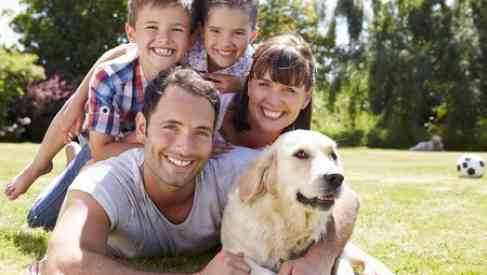family with a dog pet
