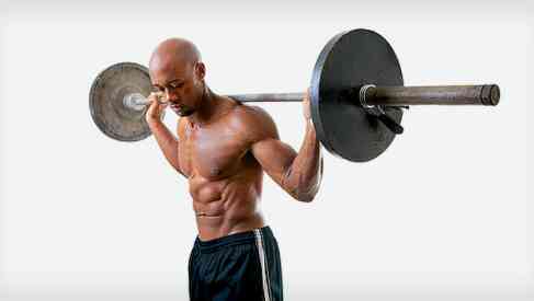man lifting weights