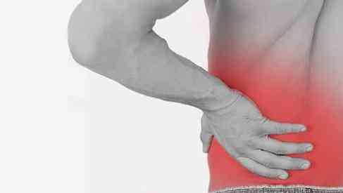 man suffering from back pain