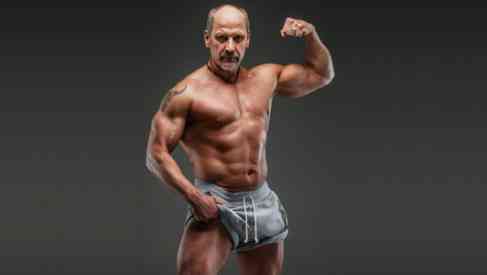 muscular man taking testosterone supplementation