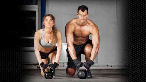 strong couple doing gym work